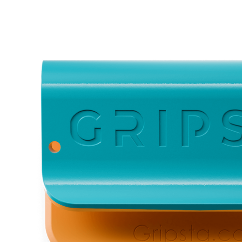 Close-up of a blue and orange plastic grip with the word GRIPSTA embossed on it.