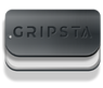 A metallic rectangular clip with the word GRIPSTA engraved on it.